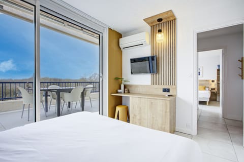 Superior Quadruple Room, Mountain View | Minibar, in-room safe, desk, laptop workspace
