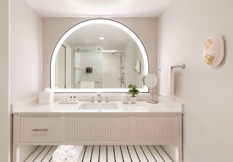 Designer toiletries, hair dryer, towels, soap