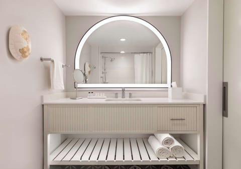 Designer toiletries, hair dryer, towels, soap