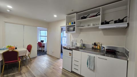 Fridge, microwave, stovetop, cookware/dishes/utensils