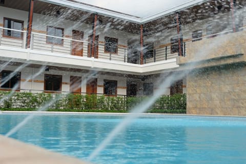 Outdoor pool, a natural pool, open 6 AM to 11 PM, free cabanas