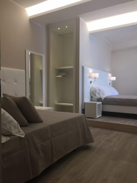 Junior Suite, Multiple Beds | Free WiFi, bed sheets