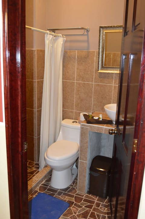 Basic Double Room, 5 Bedrooms | Bathroom | Shower, deep soaking tub, free toiletries, towels