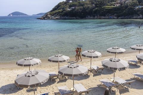 Private beach, white sand, beach cabanas, sun loungers