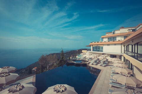 Seasonal outdoor pool, open 8:00 AM to 8:00 PM, sun loungers