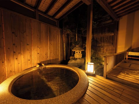 Japanese Style Room with Low Bed and Open-air Bath | Bathroom | Slippers, bidet, towels
