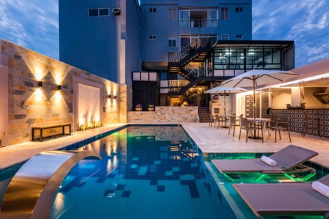 Outdoor pool, open 10:00 AM to 10:00 PM, sun loungers