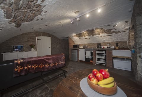 Apartment, 1 Bedroom | Living room | Flat-screen TV