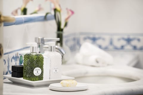 Junior Suite, Sea View | Bathroom | Designer toiletries, hair dryer, bathrobes, slippers