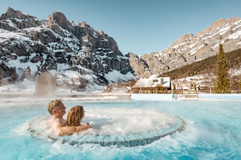 2 indoor pools, 2 outdoor pools, open 9:00 AM to 8:00 PM, pool umbrellas