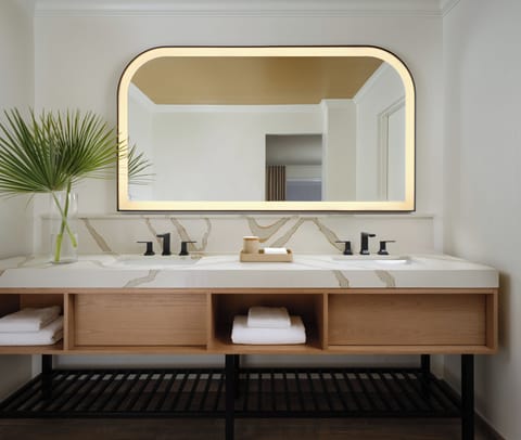 Designer toiletries, hair dryer, bathrobes, towels