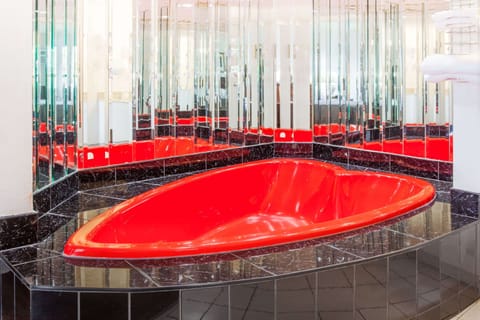 Suite, 1 King Bed, Non Smoking | Bathroom | Shower, hair dryer, towels