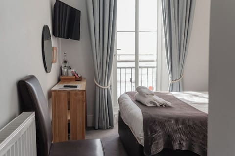 Standard Double Room, Sea View | In-room safe, iron/ironing board, free wired internet, bed sheets