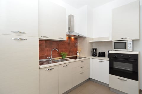 Apartment, 2 Bedrooms (1293/12301) | Private kitchen | Fridge, coffee/tea maker