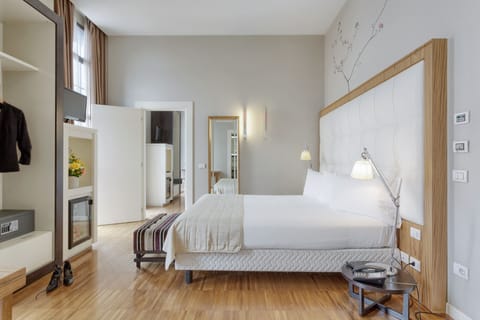 Family Room | Premium bedding, down comforters, minibar, in-room safe