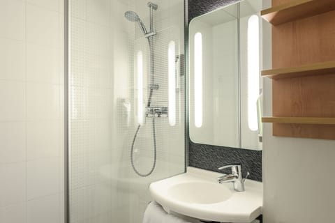 Eco-friendly toiletries, hair dryer, towels