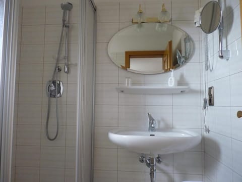 Hair dryer, slippers, towels