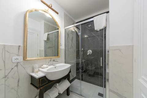 Shower, free toiletries, hair dryer, bathrobes