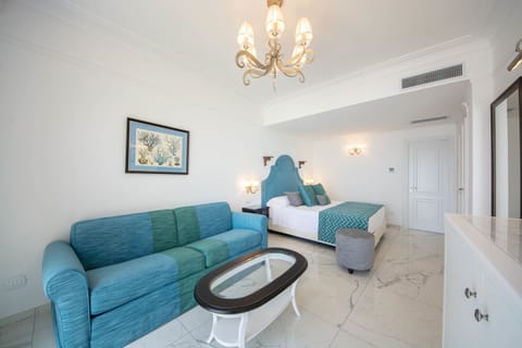 Junior Suite, Terrace, Sea View | Premium bedding, minibar, in-room safe, individually decorated
