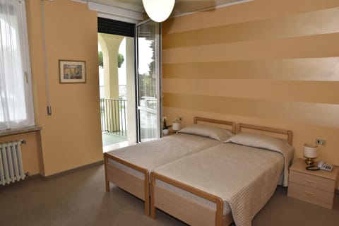 Double or Twin Room, Balcony, Lake View | Minibar, in-room safe, desk, free WiFi