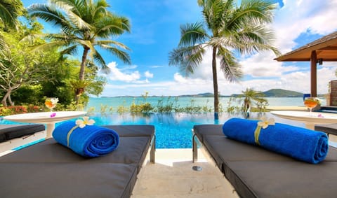 Outdoor pool, an infinity pool, free cabanas, pool umbrellas