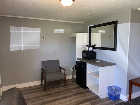 Blackout drapes, iron/ironing board, free cribs/infant beds