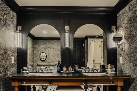 Separate tub and shower, designer toiletries, hair dryer, bathrobes