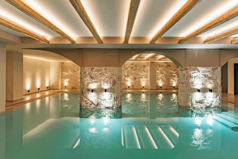 Indoor pool, outdoor pool, pool umbrellas, sun loungers