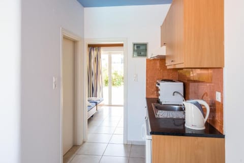 Standard Apartment | Private kitchen | Mini-fridge, stovetop, coffee/tea maker, electric kettle