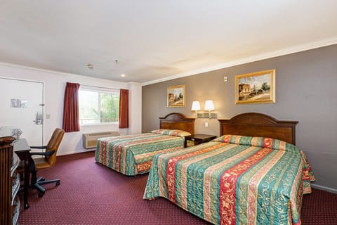 Standard Room, 2 Queen Beds | Desk, iron/ironing board, free WiFi, bed sheets