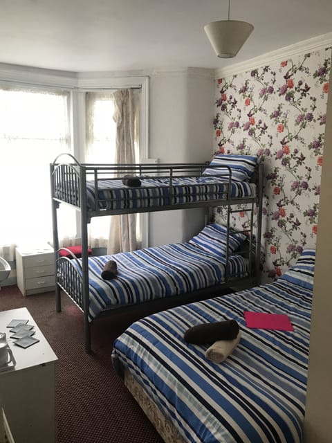 Quadruple Room | Iron/ironing board, free WiFi, bed sheets