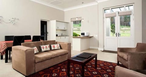 Family Apartment, 2 Bedrooms | Living area | Flat-screen TV, DVD player