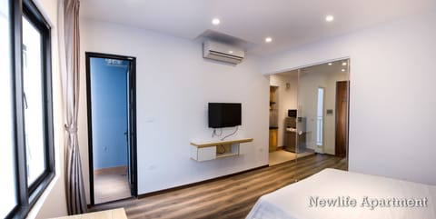 Apartment, 1 Bedroom | 1 bedroom, desk, blackout drapes, iron/ironing board