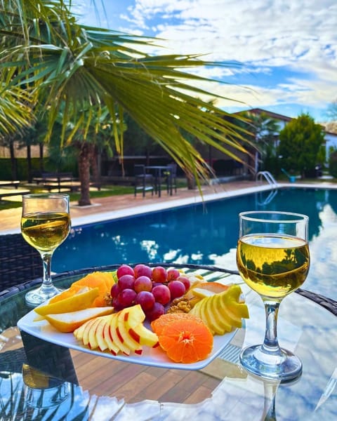 Outdoor pool, pool umbrellas, sun loungers