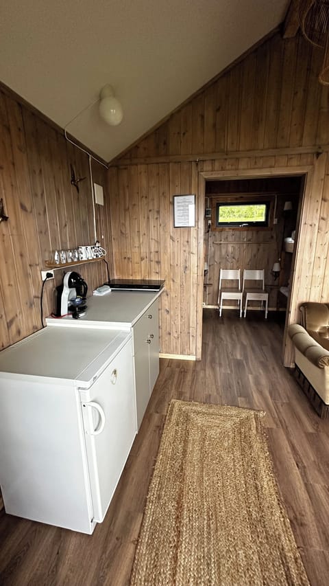 Basic Cabin, 1 Bedroom, Shared Bathroom, Sea View | Private kitchenette | Coffee/tea maker, electric kettle, eco-friendly cleaning products