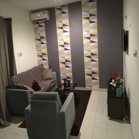Comfort Apartment, 1 Bedroom, Non Smoking | Living room | 32-inch flat-screen TV with cable channels, TV