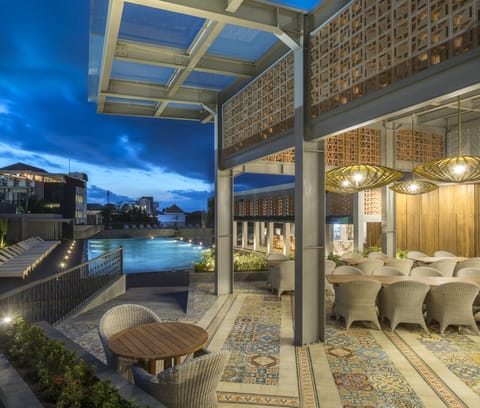 Breakfast, lunch, dinner served; international cuisine, pool views 