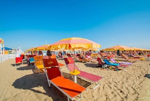 Private beach nearby, windsurfing, beach bar