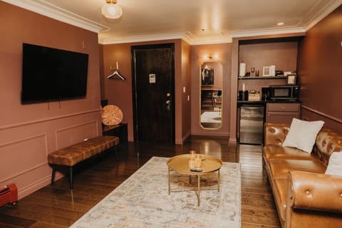 1 King Bed Luxury Suite - 3rd Floor | Living area | 42-inch flat-screen TV with cable channels, TV, streaming services
