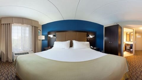 Desk, laptop workspace, blackout drapes, iron/ironing board