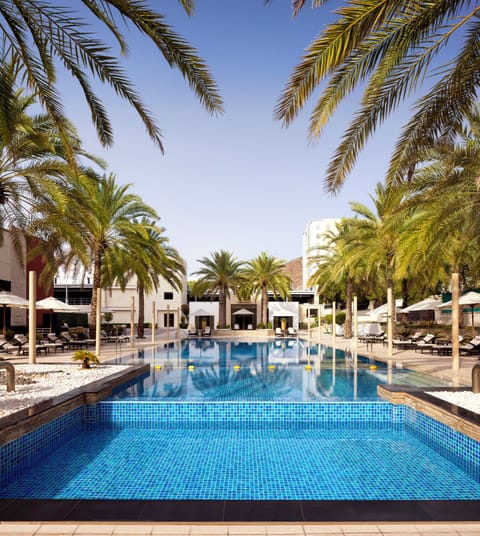 Indoor pool, outdoor pool, open 6:00 AM to 9:00 PM, pool umbrellas