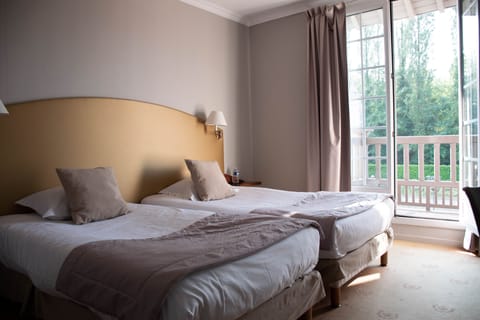 Comfort Double or Twin Room | Desk, free cribs/infant beds, free WiFi, bed sheets