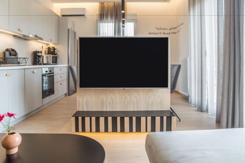 Deluxe Apartment, 4 Bedrooms, Terrace, City View | Living area | Flat-screen TV, Netflix