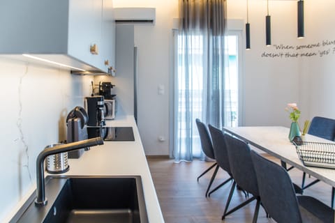 Deluxe Apartment, 4 Bedrooms, Terrace, City View | Private kitchen | Full-size fridge, microwave, oven, stovetop