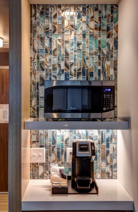 Premium bedding, down comforters, pillowtop beds, minibar