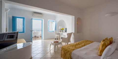 Suite (Charm) | Living area | 30-inch flat-screen TV with satellite channels