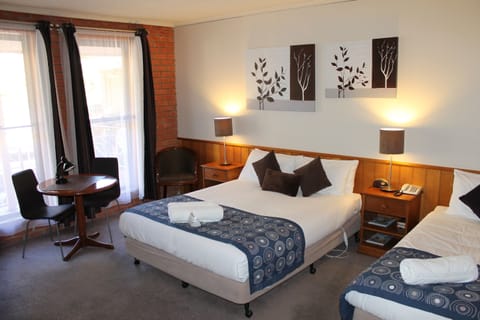 Standard Triple Room | Minibar, desk, iron/ironing board, free WiFi