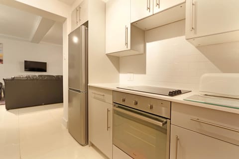 Comfort Apartment, 2 Bedrooms | Private kitchen | Full-size fridge, microwave, oven, stovetop