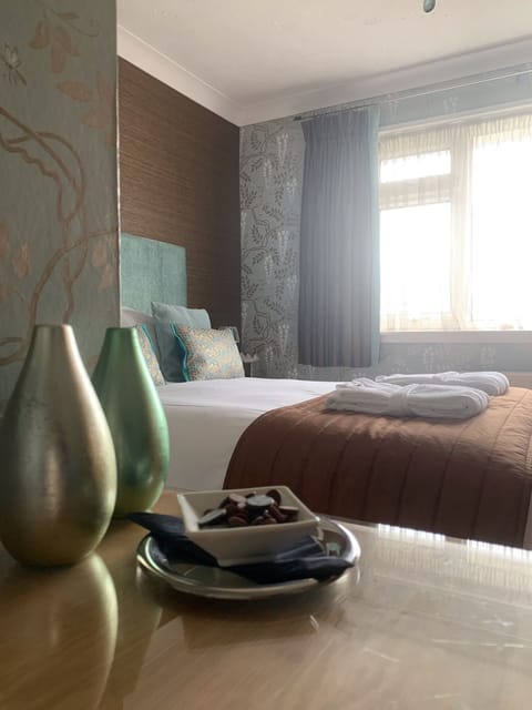 Premium bedding, down comforters, individually decorated