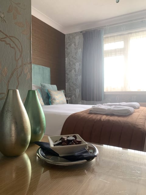 Premium bedding, down comforters, individually decorated